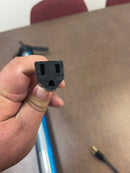 Detail of the Jameson shop light's ends, showing the power input up close.