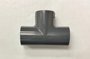 Top view of a new 3/4 inch Schedule 80 PVC Tee fitting (Spears 801-007), gray color.