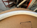 Close-up side view of the new 1 inch marine sanitation hose, showing its smooth white FDA-grade PVC and vinyl helix construction.