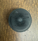 Top view of brand new Caplugs AS138 Electrical Connector Dust Caps, showing circular shape.