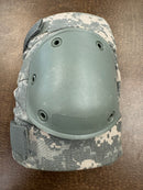 Detail view of new, authentic military knee pads, Made in USA, showing padding and strap details.