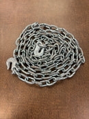 New 1/4 inch galvanized Grade 30 tow chain, coiled with hooks visible, in its original packaging.