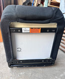 Bottom view of a new black cloth bucket seat, revealing the threaded metal base for attachment.