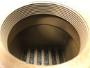Close-up view of the 4-inch threaded intake on the bottom of the cast iron floor drain.
