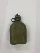 Like new US military canteen, main front view, shown without its canvas cover to reveal the canteen itself.