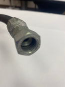 Close-up view of one -8 JIC female hose end, professionally crimped onto the Gates hydraulic hose.