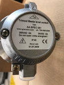 Back or bottom view of the Trimod-Besta liquid level switch, with a clear close-up of the product information plate or sticker showing model and specifications.