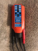 Top view of the Etcon VT154 tester, displaying its robust construction and connection leads.